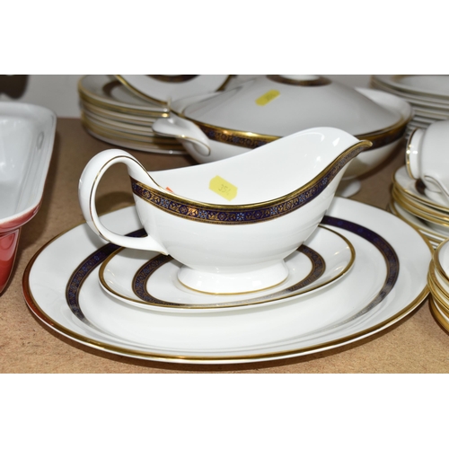 354 - A ROYAL DOULTON 'HARLOW' PATTERN DINNER SET, comprising two gravy jugs, one stand, an oval meat plat... 