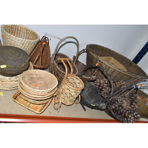 365 - A QUANTITY OF WICKER BASKETS, to include an oval laundry basket, four flower baskets and a quantity ... 