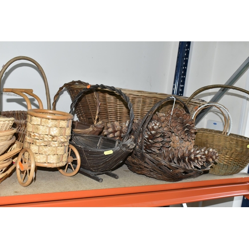 365 - A QUANTITY OF WICKER BASKETS, to include an oval laundry basket, four flower baskets and a quantity ... 