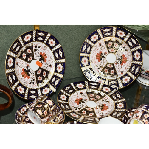 380 - A GROUP OF ROYAL CROWN DERBY IMARI 2451 TEA WARES, to include three tea plates, two side plates - on... 