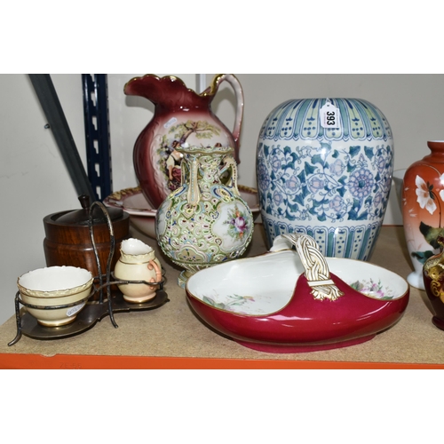 393 - A GROUP OF EARLY 20TH CENTURY CERAMICS, comprising a blue and white Chinese water bucket, a hand pai... 