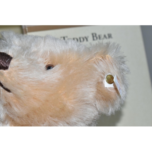 395 - A BOXED STEIFF BEAR - British Collector's Replica, blond 43, with growler and waistcoat, issued in a... 