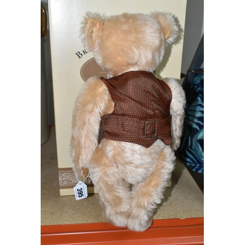 395 - A BOXED STEIFF BEAR - British Collector's Replica, blond 43, with growler and waistcoat, issued in a... 