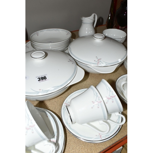 396 - A ROYAL DOULTON 'CARNATION' PATTERN DINNER SET, comprising two covered tureens, an oval meat plate, ... 