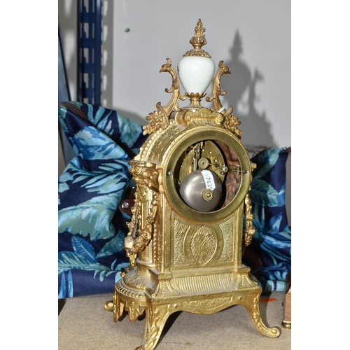 403 - A FRENCH STYLE GILT METAL MANTEL CLOCK, with hand painted porcelain dial and front panel, eight day ... 