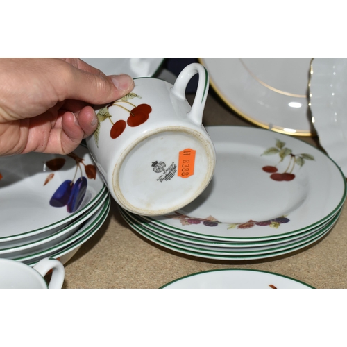 407 - A GROUP OF ROYAL WORCESTER 'EVESHAM VALE' PATTERN DINNERWARE, comprising three tea cups , three sauc... 