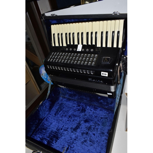 418 - A CASED BAILE ACCORDION, in gloss black, with eighty buttons, thirty seven keys and seven tone switc... 