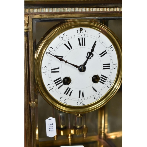 422 - A BRASS FOUR GLASS MANTEL CLOCK, with mercury pendulum, enamel dial with Roman numerals and Arabic f... 