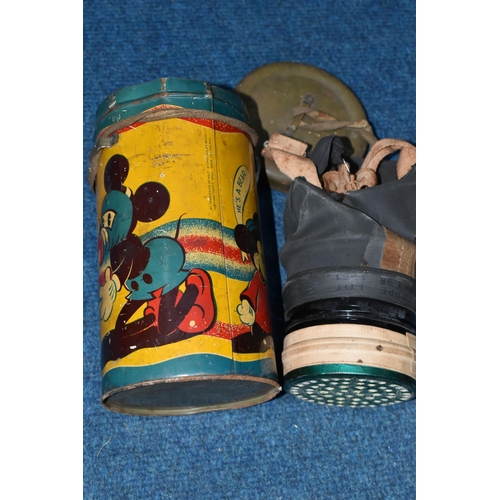 427 - A MICKEY MOUSE GAS MASK CASE, multi-coloured lithographed tinplate case with lid, showing Mickey wea... 