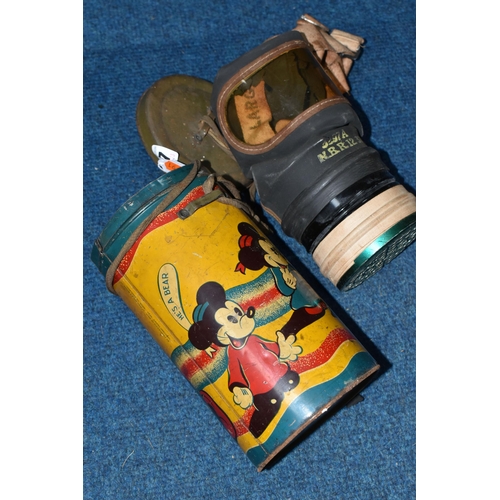 427 - A MICKEY MOUSE GAS MASK CASE, multi-coloured lithographed tinplate case with lid, showing Mickey wea... 