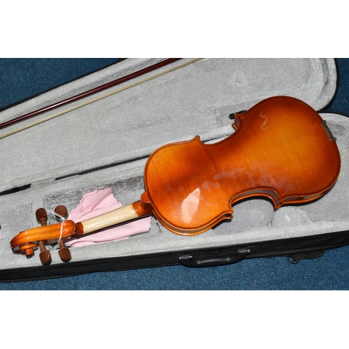 429 - A CASED HALF SIZE VIOLIN, having a two piece back, length 51cm, the bow having mother of pearl eyes ... 