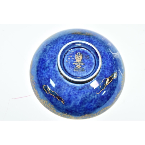 442 - A WEDGWOOD BONE CHINA LUSTRE PIN DISH, pattern no. Z4829, having a mottled blue exterior, a mother o... 