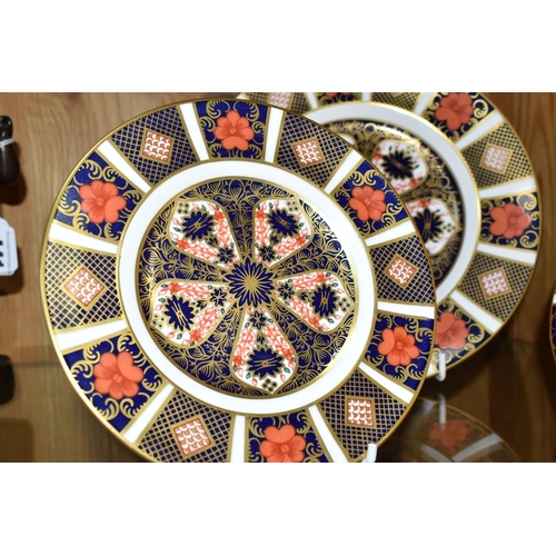 443 - THREE ROYAL CROWN DERBY IMARI 1128 PLATES, one 21.5cm diameter tea plate, and two 16cm side plates (... 