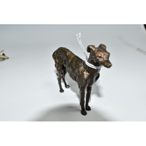 446 - TWO SMALL BRONZE FIGURES OF DOGS, comprising a bronze sculpture of a standing greyhound, height 9cm ... 