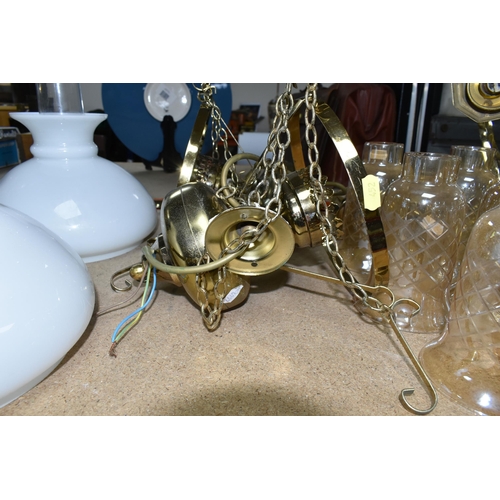 452 - A QUANTITY OF BRASS LIGHT FITTINGS AND CHANDELIERS, comprising a five arm and three arm brass chande... 