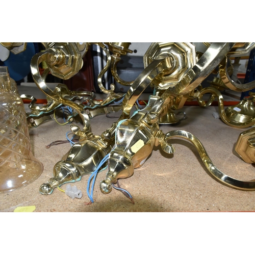 452 - A QUANTITY OF BRASS LIGHT FITTINGS AND CHANDELIERS, comprising a five arm and three arm brass chande... 