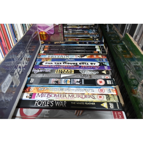 456 - FIVE BOXES OF DVDS, C.DS AND VHS CASSETTES, to include approximately twenty videos, over three hundr... 