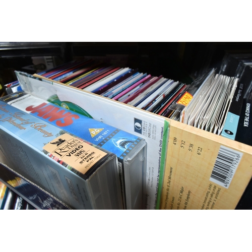 456 - FIVE BOXES OF DVDS, C.DS AND VHS CASSETTES, to include approximately twenty videos, over three hundr... 