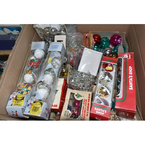 555 - TWO BOXES OF CHRISTMAS DECORATIONS, including baubles, lights and soft toys (2 boxes)