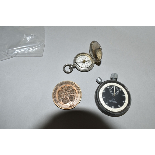 564 - AN OMEGA STOPWATCH, A NATIONAL CHRYSANTHEMUM SOCIETY AFFILIATED SOCIETIES MEDAL AND A POCKET COMPASS... 