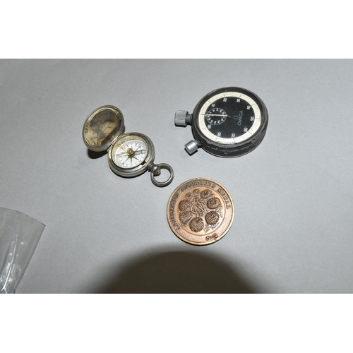 564 - AN OMEGA STOPWATCH, A NATIONAL CHRYSANTHEMUM SOCIETY AFFILIATED SOCIETIES MEDAL AND A POCKET COMPASS... 