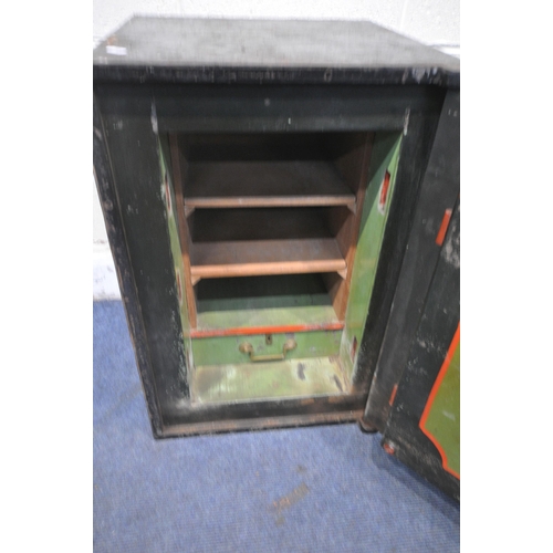 1197 - A VINTAGE BENT STEEL SAFE, with a plaque reading Lancashire fire and thief proof safe co Manchester,... 