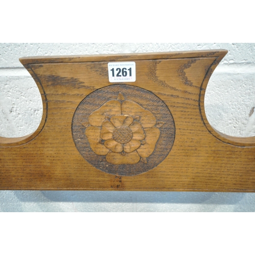 1198 - A 20TH CENTURY OAK SAVONAROLA CHAIR, the detachable back rest with floral central crest, X framed su... 