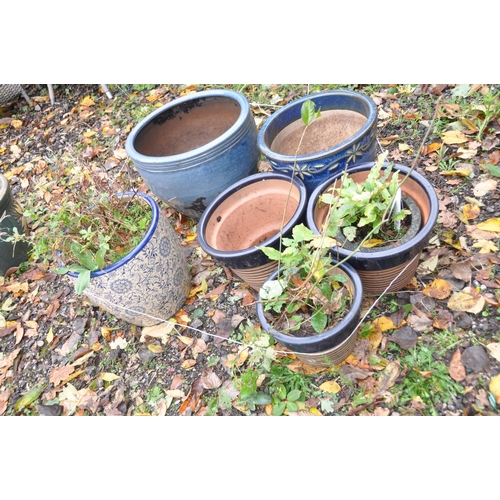 1018 - SIX VARIOUS BLUE GLAZED PLANT POTS, of various sizes, largest diameter 47cm x height 35cm, along wit... 