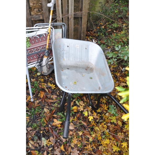 1023 - A CIRCULAR METAL AND GLASS GARDEN TABLE, diameter 60cn x height 70cm, a pair of rattan armchairs, pa... 