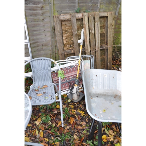 1023 - A CIRCULAR METAL AND GLASS GARDEN TABLE, diameter 60cn x height 70cm, a pair of rattan armchairs, pa... 