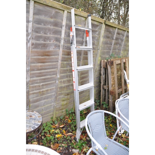 1023 - A CIRCULAR METAL AND GLASS GARDEN TABLE, diameter 60cn x height 70cm, a pair of rattan armchairs, pa... 