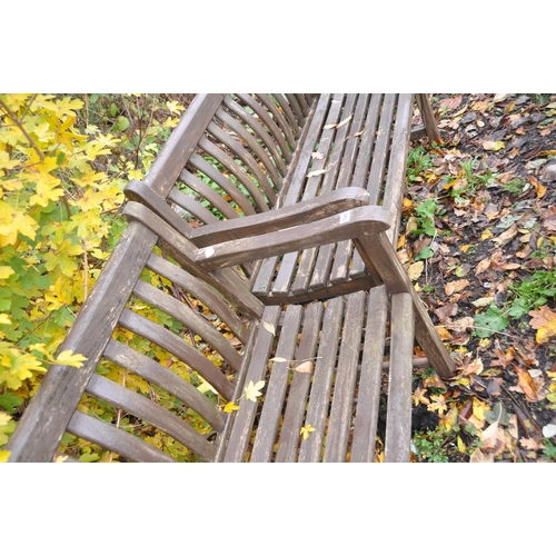 1024 - A PAIR OF STAINED TEAK SLATTED GARDEN BENCHES, length 122cm (condition report: paint peeling, frames... 