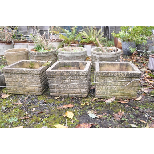 1027 - A SET OF THREE WEATHERED COMPOSITE BRICK EFFECT SQUARE PLANTERS, signed Sanford stone, 40cm x height... 