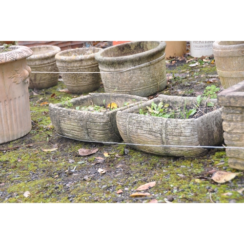 1027 - A SET OF THREE WEATHERED COMPOSITE BRICK EFFECT SQUARE PLANTERS, signed Sanford stone, 40cm x height... 