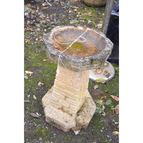 1033 - A WEATHERED COMPOSITE BRICK EFFECT BIRD BATH, 39cm diameter x height 61cm