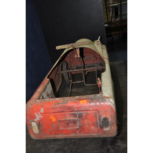 1057 - A 1950'S CHILDS TIN PLATE PEDAL CAR with distressed paint finish, total length 36in (Condition Repor... 