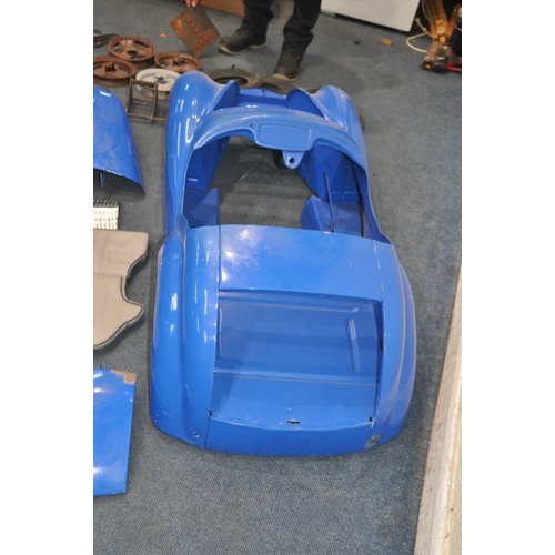 1063 - AN AUSTIN J40 CHILDS PEDAL CAR SHELL AND PARTS, serial number to chassis appears to read 22841, body... 