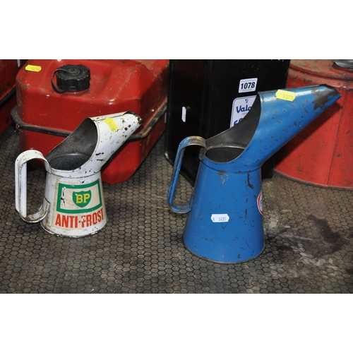 1078 - TEN VINTAGE FUEL AND OIL CANS including a Fina and a BP oil cans, two petrol cans, a Valor Paraffin ... 