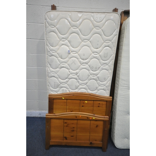 1322 - A PINE SINGLE GUEST BED, with a cumfilux mattress and somerset mattress (condition report: general s... 