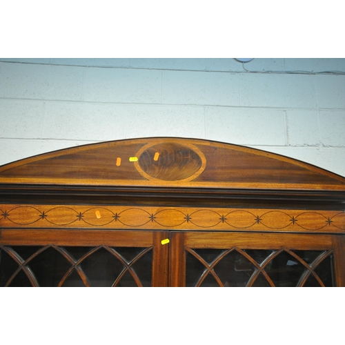 1323 - A GEORGIAN MAHOGANY AND CROSSBANDED SECRETAIRE BOOKCASE, the top with a domed top, double astragal g... 