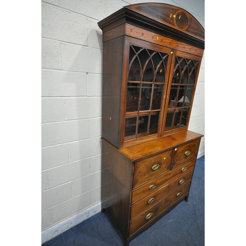 1323 - A GEORGIAN MAHOGANY AND CROSSBANDED SECRETAIRE BOOKCASE, the top with a domed top, double astragal g... 