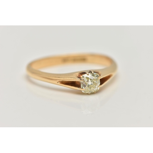 10 - A SINGLE STONE DIAMOND RING, the old mine cut diamond in an eight claw setting to the bifurcated sho... 