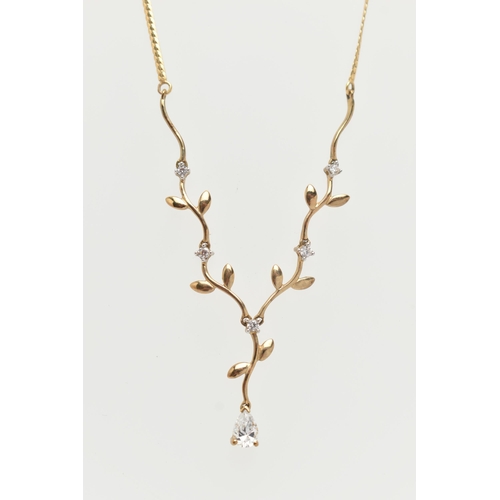 16 - A 9CT GOLD NECKLACE AND DROP EARRINGS, the necklace designed as a V-shape foliate line set with circ... 