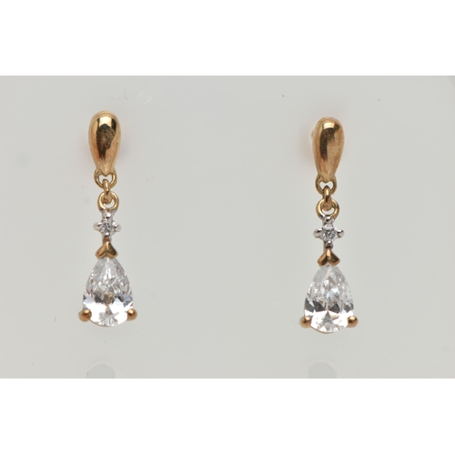 16 - A 9CT GOLD NECKLACE AND DROP EARRINGS, the necklace designed as a V-shape foliate line set with circ... 