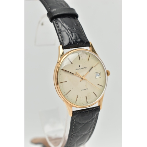 2 - A 9CT GOLD GARRARD WRISTWATCH, with quartz movement, circular gold coloured dial signed Garrard Quar... 