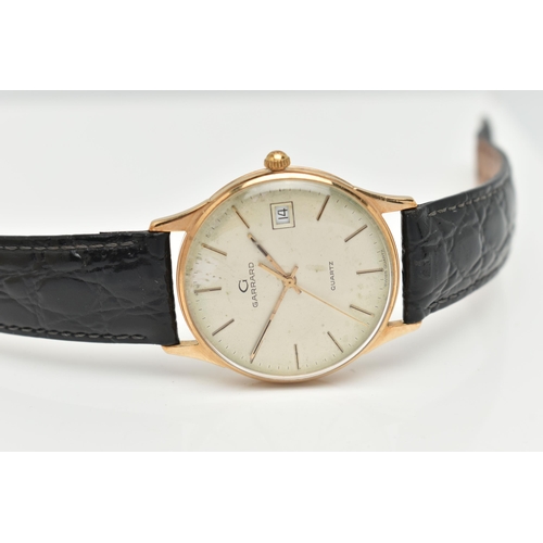 2 - A 9CT GOLD GARRARD WRISTWATCH, with quartz movement, circular gold coloured dial signed Garrard Quar... 