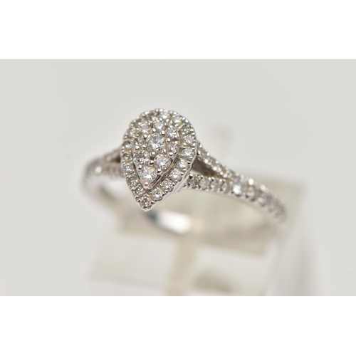 30 - A 'VERA WANG', 18CT WHITE GOLD, DIAMOND SET RING, of a pear cut design, set with a cluster of round ... 