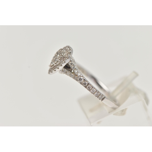 30 - A 'VERA WANG', 18CT WHITE GOLD, DIAMOND SET RING, of a pear cut design, set with a cluster of round ... 