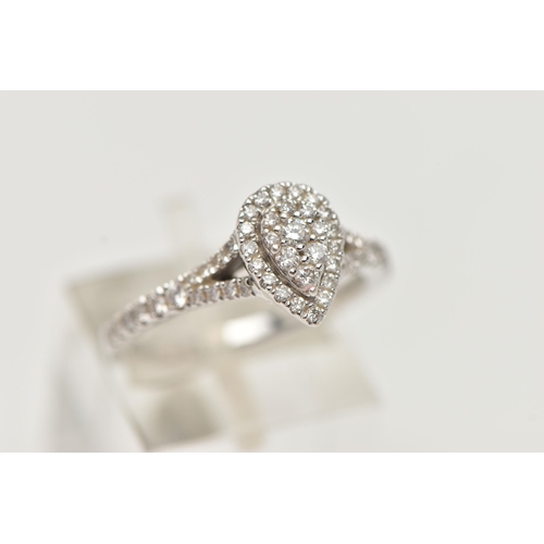 30 - A 'VERA WANG', 18CT WHITE GOLD, DIAMOND SET RING, of a pear cut design, set with a cluster of round ... 