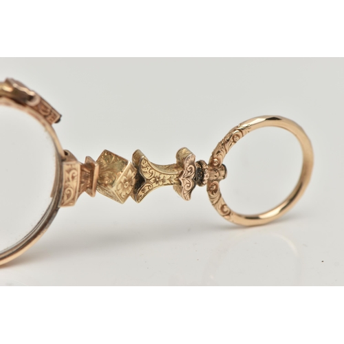 32 - A PAIR OF EARLY 20TH CENTURY, 12CT GOLD LORGNETTE READING GLASSES, decorated with a floral and folia... 